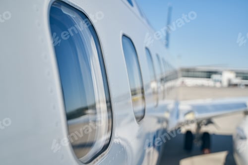 Preview: Glass windows on a passenger aircraft fuselage
