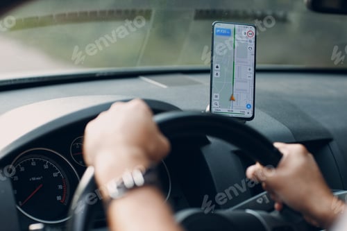 Preview: Navigator in car vehicle transportation commuter. Driver man using mobile phone navigator