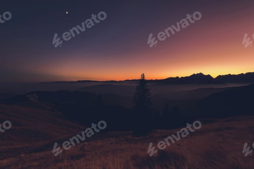 Preview: Sunset in the grassy hills