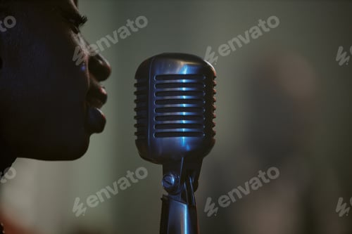 Preview: Black Woman Singing In Mic Side View