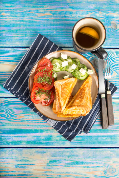 Preview: Sandwiches with cheese, tomatoes and cucumber.