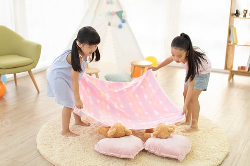 Preview: Cute Chinese children playing in living room