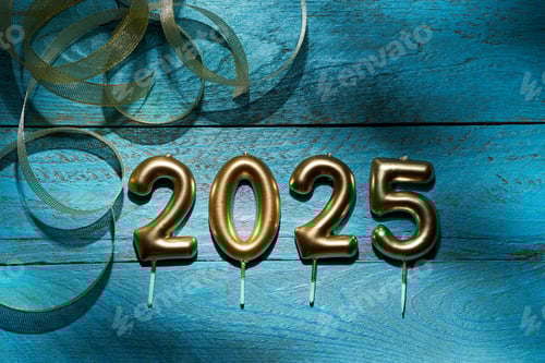 Preview: Celebration candles in the shape of the year 2025 on a blue wooden surface with gold ribbons.