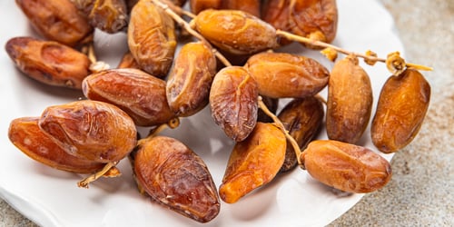 Preview: date on a branch dried sweet fruit fresh meal food snack on the table copy space food background