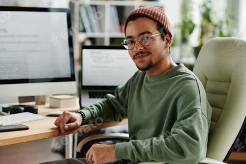 Preview: Young confident IT engineer or software developer in casualwear