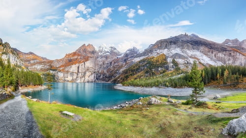 Preview: Amazing autumn view of Oeschinensee Lake.