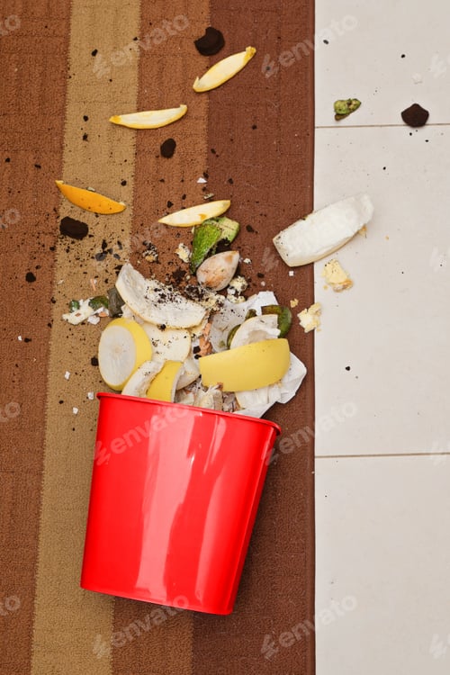 Preview: Red Trash Can and Scraps on Floor
