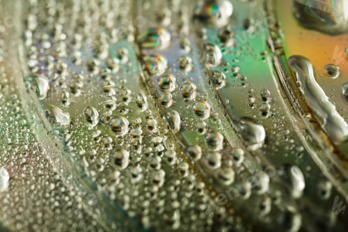 Preview: Colorful, Rainbow, Abstract Background. Water Drops. Condensate. Texture Of Glass. Parallel Lines