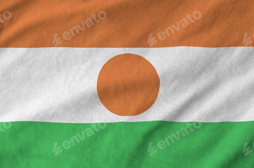 Preview: Niger flag depicted on folded wavy fabric of old cloth