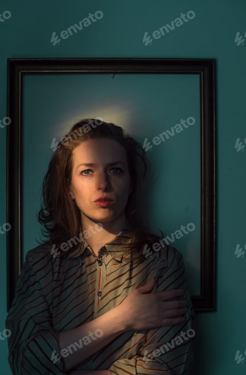 Preview: expressive caucasian female portrait,framed in frame