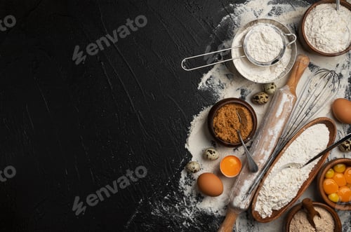 Preview: Baking ingredients for dough on black background