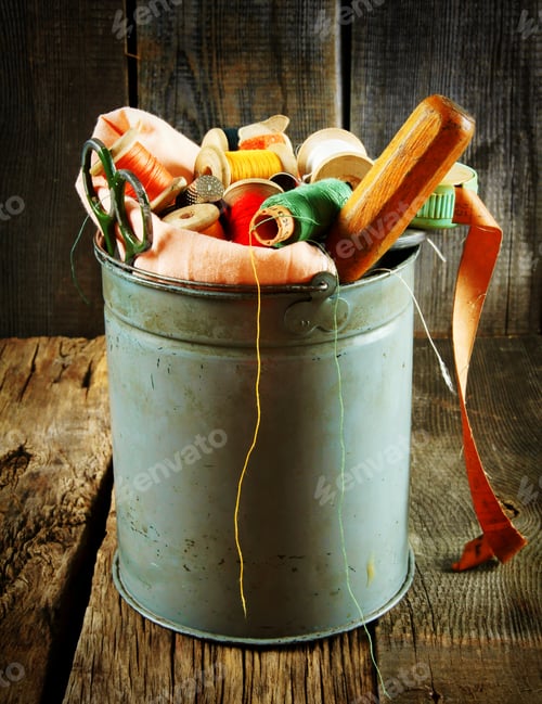Preview: Bucket with tools for sewing.
