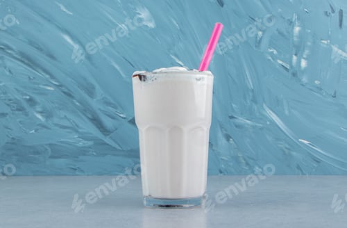 Preview: A glass of delicious milks hake on the marble background