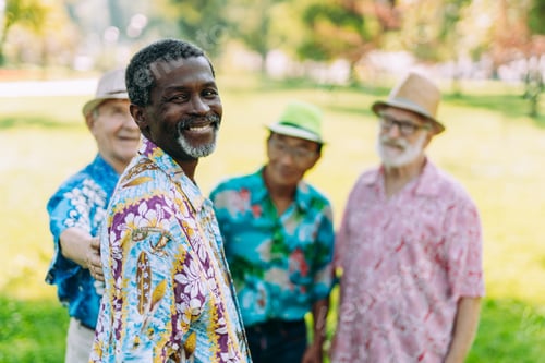 Preview: group of senior friends playing at the park