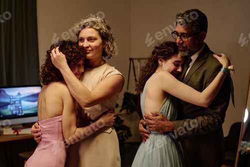 Preview: Middle Aged Caucasian Woman and Man Comforting Crying Teenager Daughters