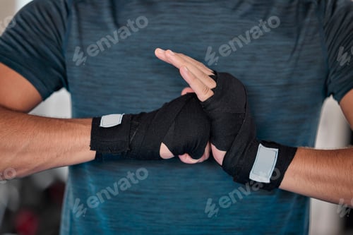Preview: Man, hands and boxing and fitness with martial arts in gym, exercise and power with strong person.