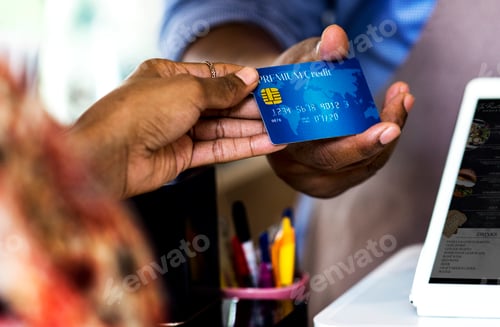 Preview: Customer paying for bakery products by credit card