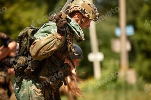 Preview: People Wearing Camouflage Walking in Nature