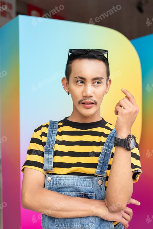 Vista previa: Empowering portrait of nonbinary genderfluid young Asian gay man