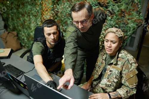 Preview: Team Works Together Looking at Computer Screen