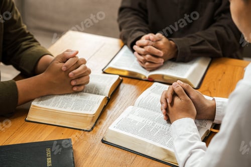 Preview: A group of young Christians working together to pray and seek blessings from God