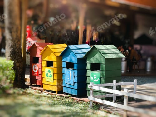 Preview: Wooden colorful public recycle bins closeup outdoor blurred background