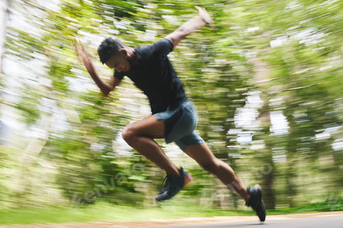 Preview: Running, fitness and blur of man in forest for marathon training, exercise and cardio workout. Spor
