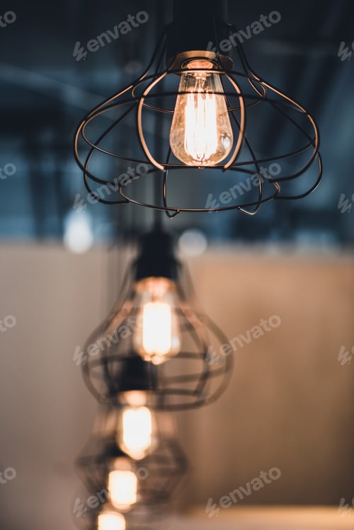 Preview: selective focus shot of row of vintage lamps