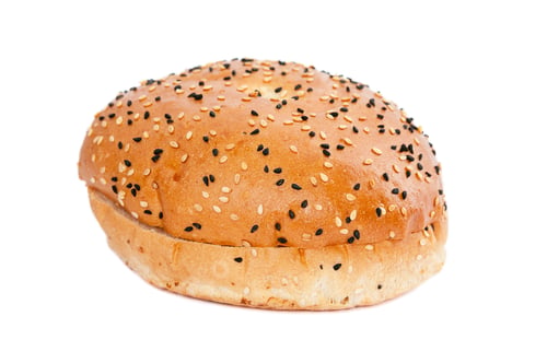 Preview: Burger bun with sesame seeds on white background