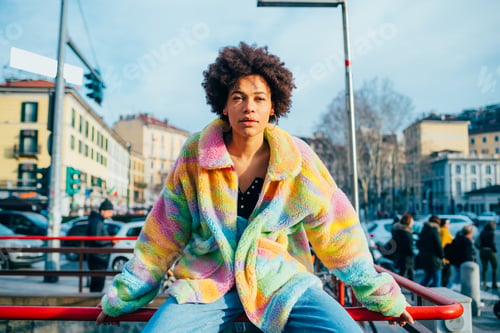 Preview: Young mixed race woman outdoor posing outdoor