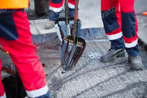 Preview: Repair of roads, highways and sidewalks. Patching. Working with a shovel falls asleep in the pit