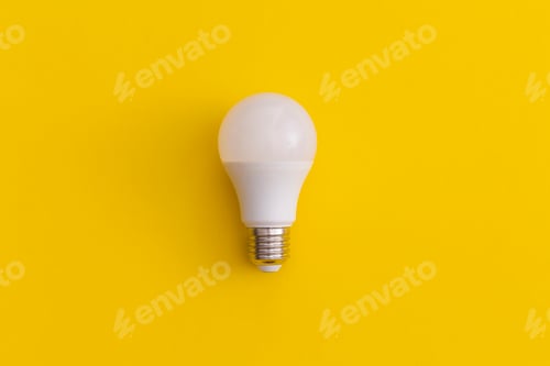 Preview: Light bulb on yellow background. Inspiration and creative idea concept.