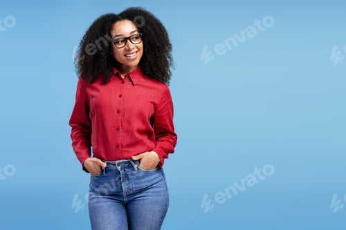 Preview: Smiling Woman with Curly Hair in Red Shirt