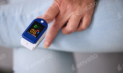 Preview: Medical, heart rate and woman with a pulse oximeter in a retirement home during consultation. Healt