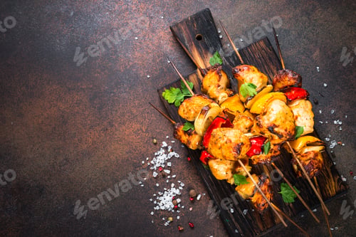 Preview: Chicken kebab with vegetables on skewers top view