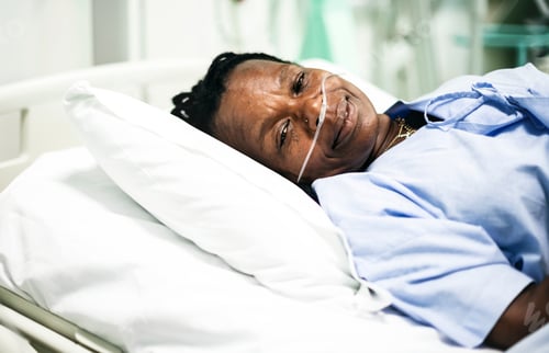 Preview: Sick woman in a hospital bed