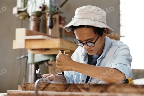 Preview: Creative Man Carving Wood