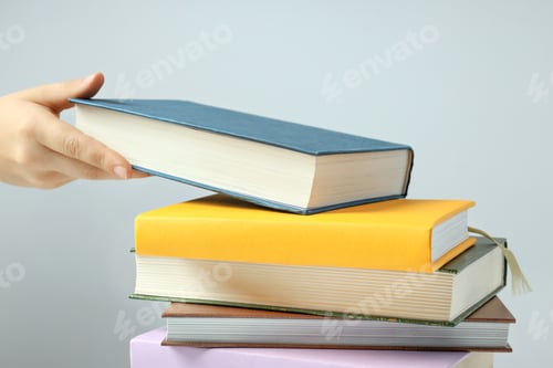 Preview: A stack of books on a light background