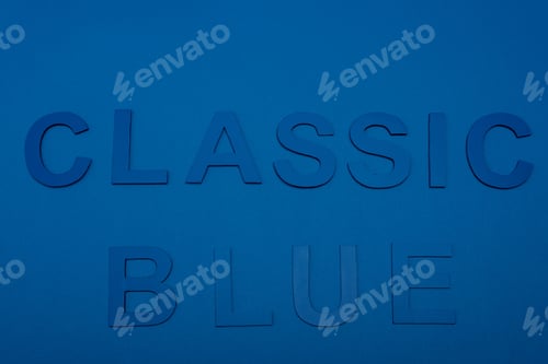 Preview: top view of classic blue lettering isolated on blue