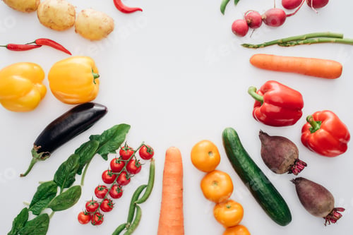 Preview: top view of various fresh ripe vegetables isolated on white background