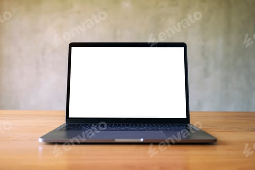Preview: Mockup image of laptop with blank white desktop screen on wooden table with concrete wall background
