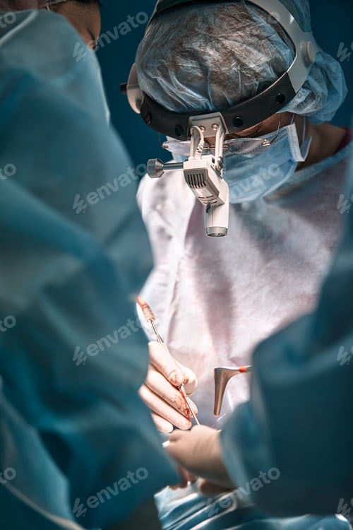 Preview: Rhinoplasty men, the surgeons gloved hands hold the instruments during nose surgery. Doctor in