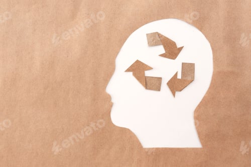 Preview: Recycling and Environmental Awareness with White head Silhouette and Brown Recycle Symbol