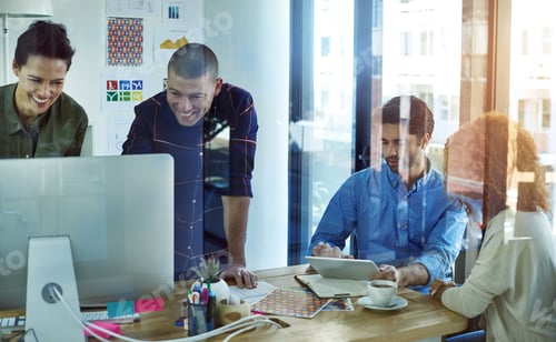 Preview: May the best collaboration win. Shot of businesspeople working in teams in a modern office.