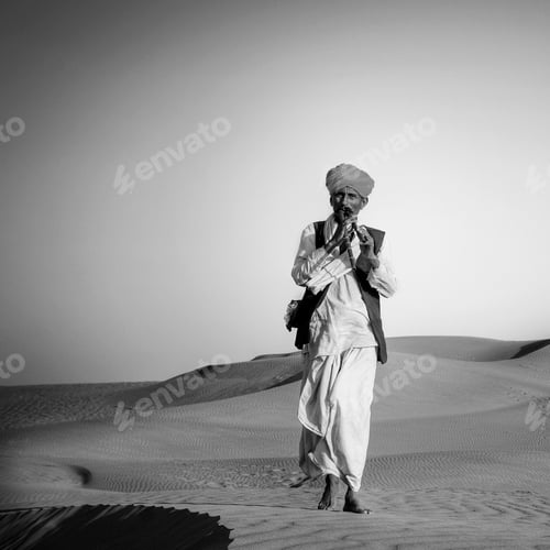 Preview: Indigenous Indian Man Playing Wind Pipe In A Desert Concept