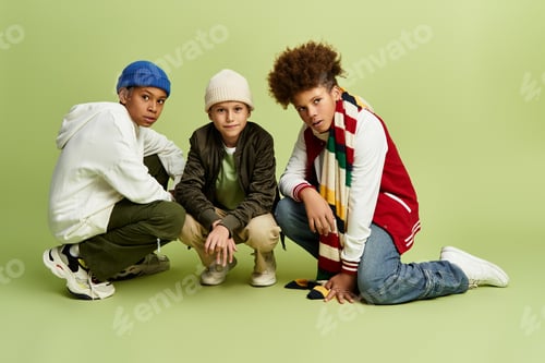 Preview: Cherishing friendship with vibrant fashion among adorable boys in a playful setting