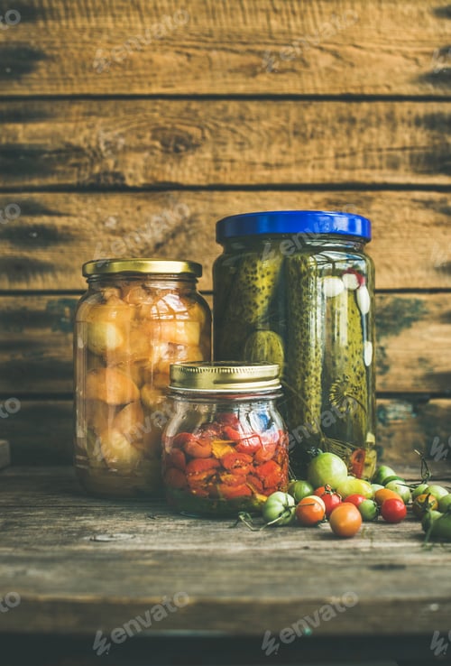 Preview: Autumn pickled vegetables in glass jars, copy space
