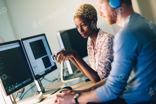 Preview: Software engineers working on project and programming in company