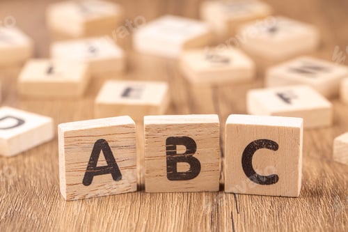 Preview: Alphabets on wooden cubes as a background