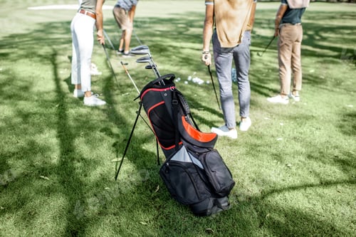 Preview: Golf bag with people on the golf course